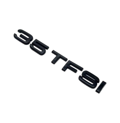 Badges coffre Audi TFSI noir - vue de profil - Becquet Voiture