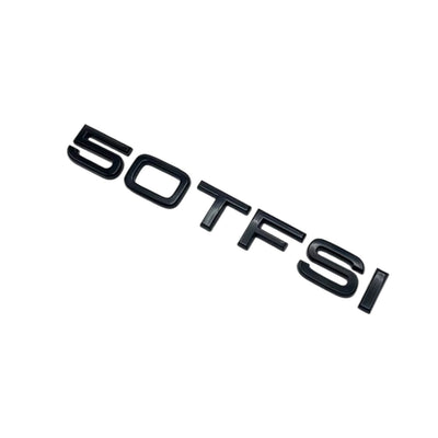 Badges coffre Audi TFSI noir - vue rapprochée - Becquet Voiture