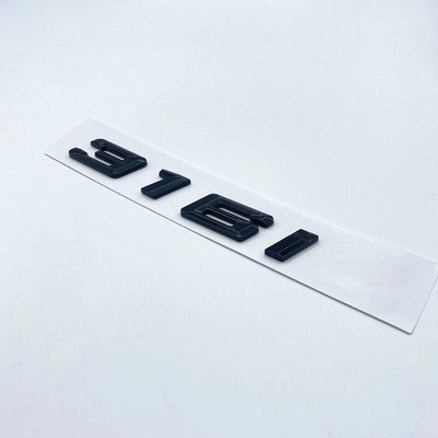Badges coffre BMW Série 3 noir brillant - installé sur véhicule 2 - Becquet Voiture