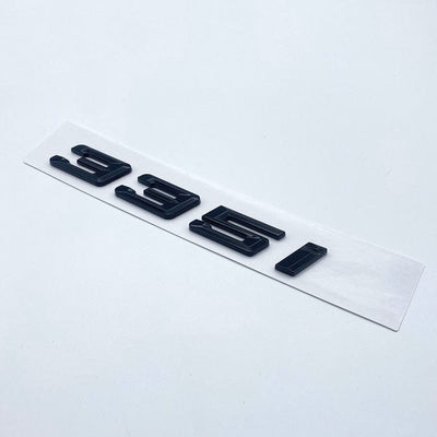 Badges coffre BMW Série 3 noir brillant - installé sur véhicule - Becquet Voiture