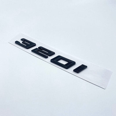 Badges coffre BMW Série 3 noir brillant - vue de dessus - Becquet Voiture