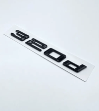 Badges coffre BMW Série 3 noir brillant - vue de face 3 - Becquet Voiture