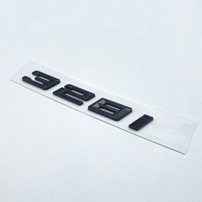Badges coffre BMW Série 3 noir brillant - vue de face - Becquet Voiture
