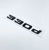 Badges coffre BMW Série 3 noir brillant - vue rapprochée 2 - Becquet Voiture