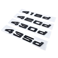 Badges coffre BMW Série 4 noir brillant - détail du montage - Becquet Voiture