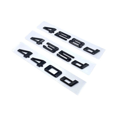 Badges coffre BMW Série 4 noir brillant - en situation - Becquet Voiture