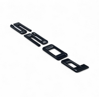 Badges coffre BMW Série 5 noir brillant - vue de profil - Becquet Voiture
