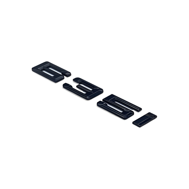 Badges coffre BMW Série 6 noir brillant - détail du montage 2 - Becquet Voiture