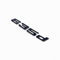 Badges coffre BMW Série 6 noir brillant - packshot studio 2 - Becquet Voiture