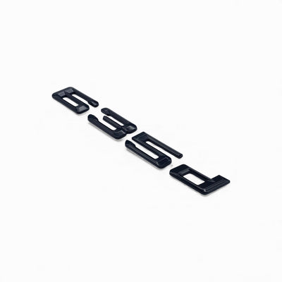 Badges coffre BMW Série 6 noir brillant - packshot studio 2 - Becquet Voiture
