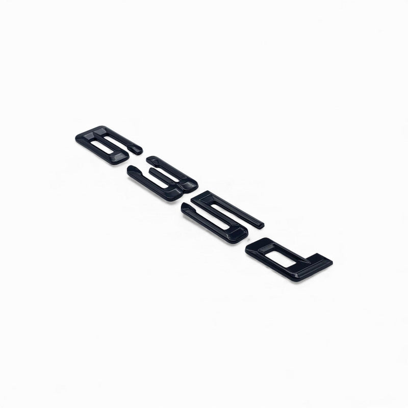 Badges coffre BMW Série 6 noir brillant - packshot studio 2 - Becquet Voiture