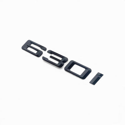Badges coffre BMW Série 6 noir brillant - vue arrière 2 - Becquet Voiture