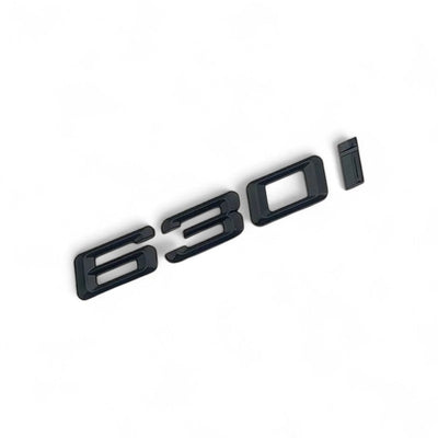 Badges coffre BMW Série 6 noir brillant - vue de face 2 - Becquet Voiture