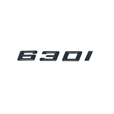 Badges coffre BMW Série 6 noir brillant - vue rapprochée - Becquet Voiture