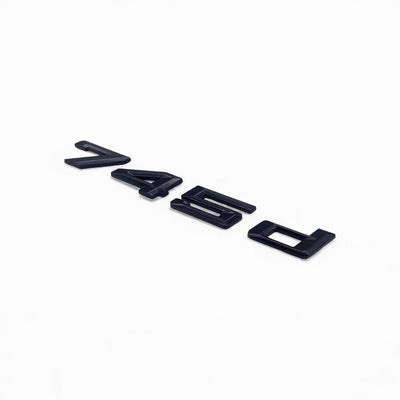 Badges coffre BMW Série 7 noir brillant - installé sur véhicule - Becquet Voiture