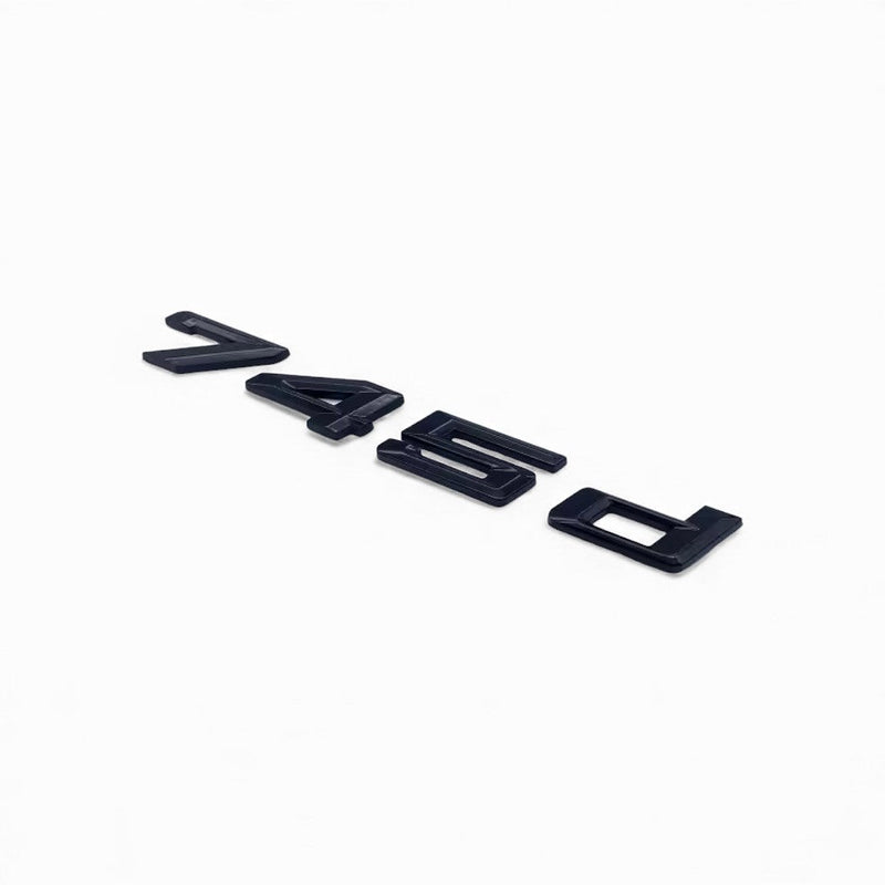 Badges coffre BMW Série 7 noir brillant - installé sur véhicule - Becquet Voiture
