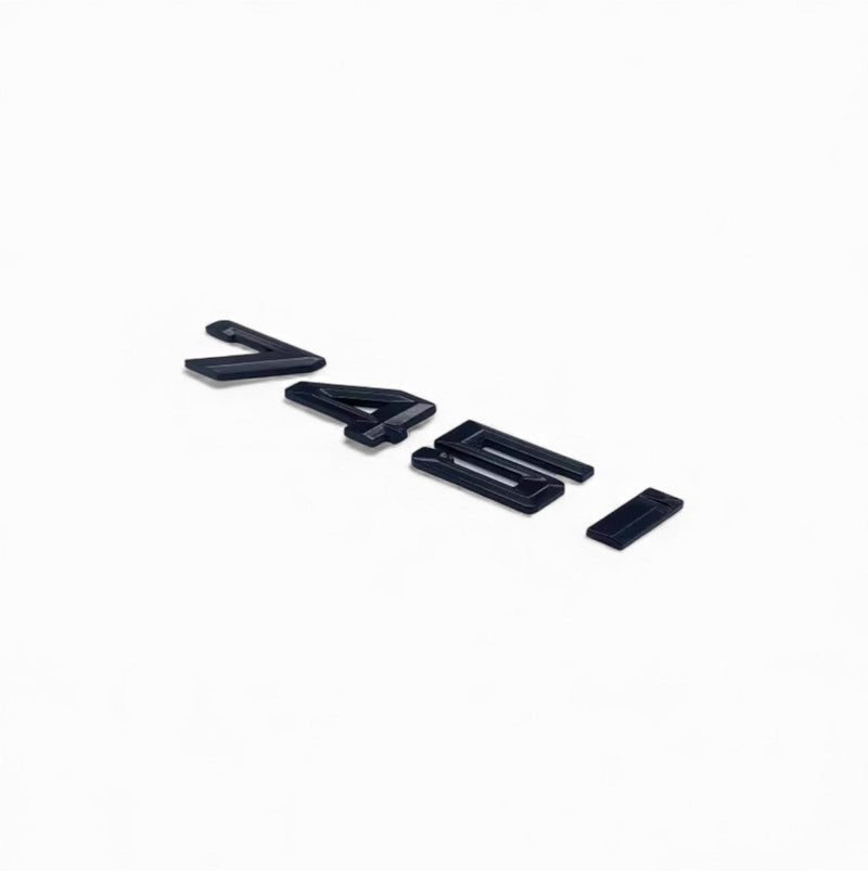 Badges coffre BMW Série 7 noir brillant - packshot studio - Becquet Voiture