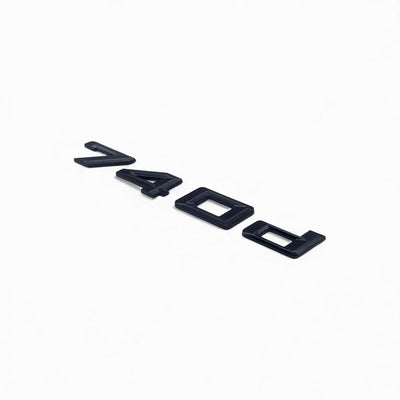 Badges coffre BMW Série 7 noir brillant - vue arrière - Becquet Voiture