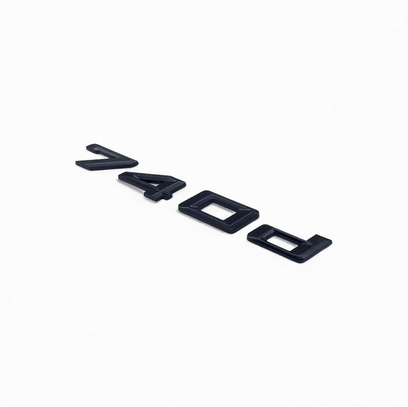 Badges coffre BMW Série 7 noir brillant - vue arrière - Becquet Voiture