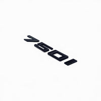 Badges coffre BMW Série 7 noir brillant - vue rapprochée - Becquet Voiture