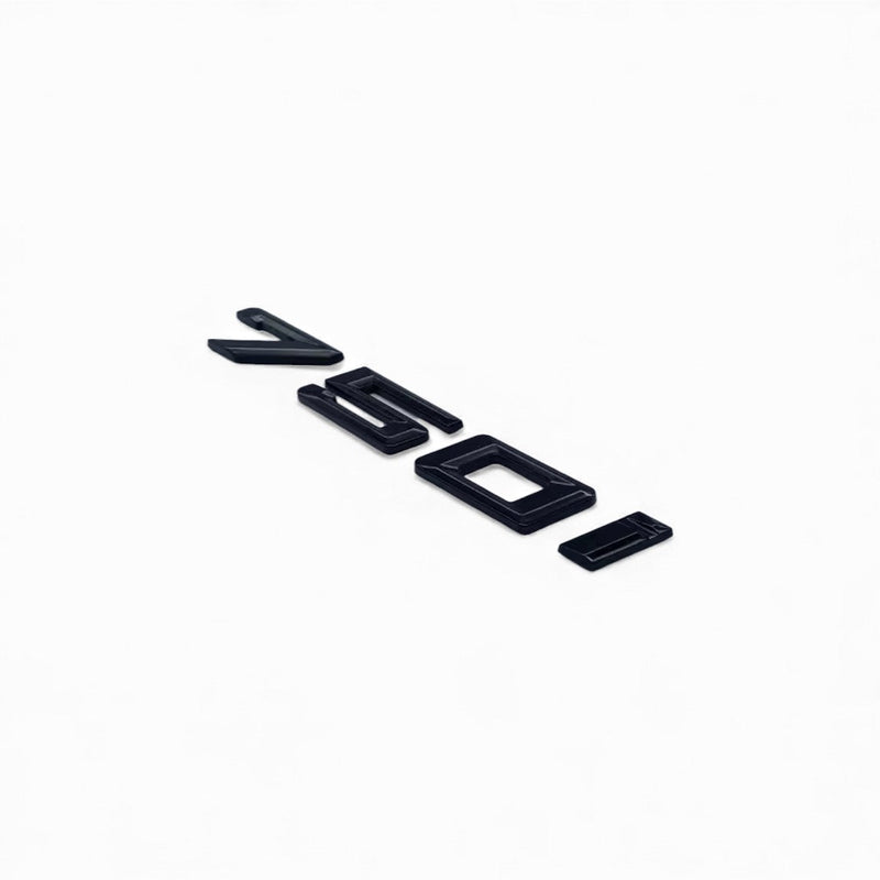 Badges coffre BMW Série 7 noir brillant - vue rapprochée - Becquet Voiture