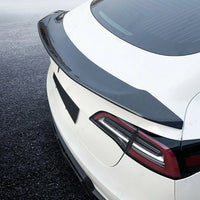 Becquet Tesla Model 3 V Style Carbone 2017-2022 - détail du montage - Becquet Voiture