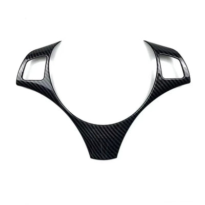 https://cdn.shopify.com/s/files/1/0565/4957/2747/files/bmw_serie_3_e90_volant_carbone2.jpg?v=1765804095