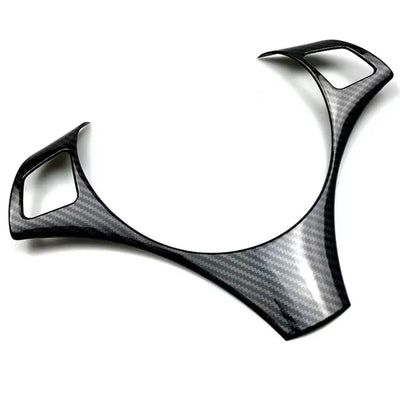 https://cdn.shopify.com/s/files/1/0565/4957/2747/files/bmw_serie_3_e90_volant_carbone.jpg?v=1765804095