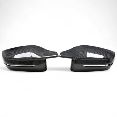 https://cdn.shopify.com/s/files/1/0565/4957/2747/files/bmw_serie_3_g20_coques_de_retroviseurs_fibre_de_carbone7.jpg?v=1761601036