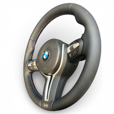 https://cdn.shopify.com/s/files/1/0565/4957/2747/files/bmw_volant_pack_m-5.jpg?v=1772905313