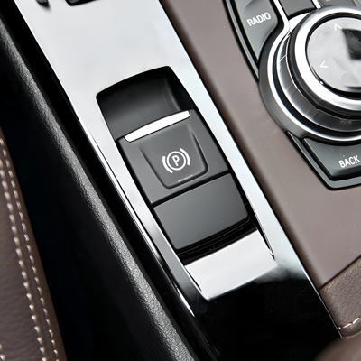 Bouton frein à main électronique BMW F20 F44 EPB - vue de profil - Becquet Voiture