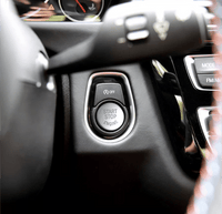 Bouton Start-Stop performance BMW couleurs - vue de trois-quarts - Becquet Voiture