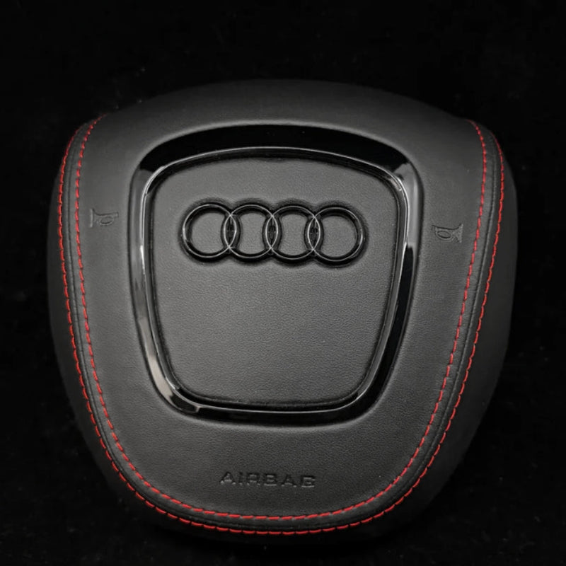Cache Airbag Audi B7 Cuir Alcantara Surpiqure - vue de trois-quarts - Becquet Voiture