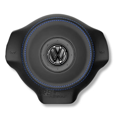 Cache Airbag VW Golf 6 Cuir Alcantara Surpiqûres Logo Noir - détail du montage - Becquet Voiture