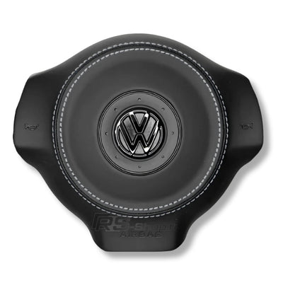 Cache Airbag VW Golf 6 Cuir Alcantara Surpiqûres Logo Noir - packshot studio - Becquet Voiture