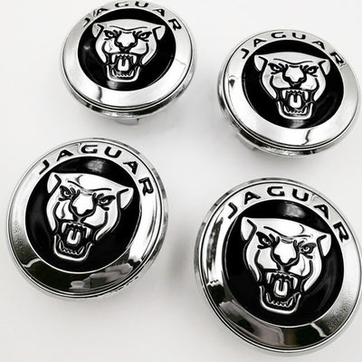 Cache Moyeu LED Flottant Jaguar 59mm ABS Kit 4 - vue de trois-quarts - Becquet Voiture