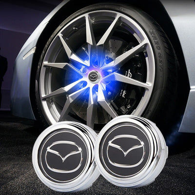 Cache Moyeu LED Flottant Mazda 56mm ABS Kit 4 - vue de face - Becquet Voiture