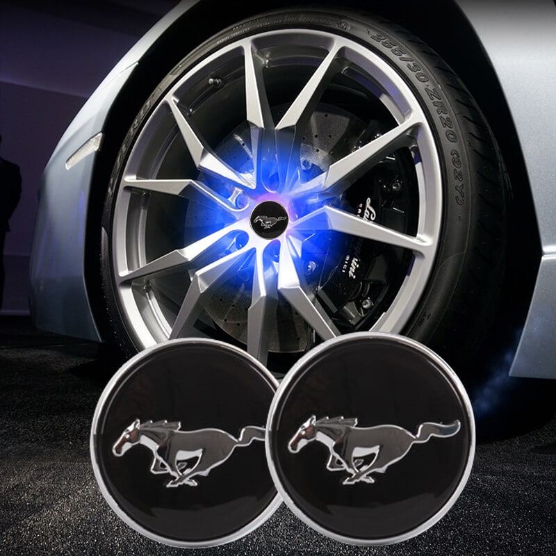 Caches Moyeu LED Mustang 54mm Flottants ABS Kit 4 - vue de face - Becquet Voiture