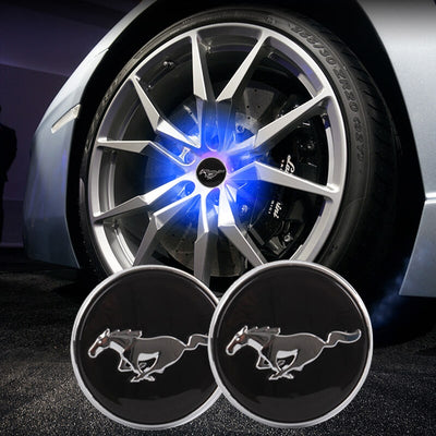 Caches Moyeu LED Mustang 54mm Flottants ABS Kit 4 - vue de face - Becquet Voiture
