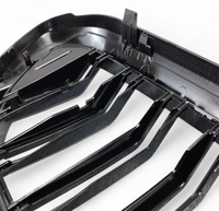 Gloss black BMW 5 Series G30 kidney grille - three-quarter view 2 - Becquet Voiture