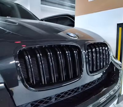 Calandre BMW X6 E71 noir brillant - vue arrière - Becquet Voiture