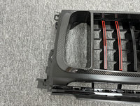 Calandre Carbone Mercedes Classe G W464 G63 Style R B900 - vue de trois-quarts - Becquet Voiture
