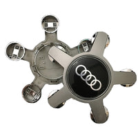 Centre Roue Audi 5 Branches 4F0601165 Logo Anneaux Noir Chrome - installé sur véhicule - Becquet Voiture