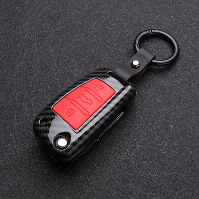Coque Clé Audi Carbone Silicone Noir Rouge - vue de trois-quarts - Becquet Voiture