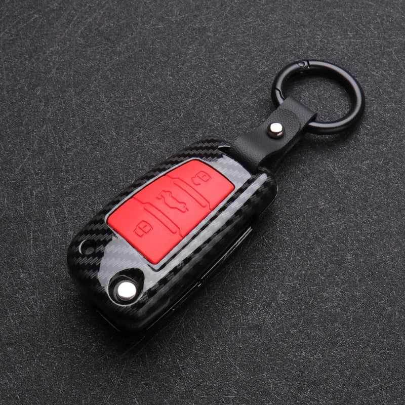 Audi Key Case Carbon Black Red Silicone - three-quarter view - Becquet Voiture