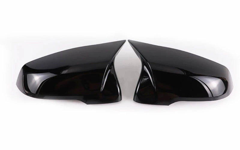 Gloss black mirror caps for BMW X1 E84 - studio packshot - Becquet Voiture