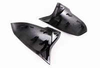 Gloss black mirror caps for BMW X1 E84 - close-up view - Becquet Voiture