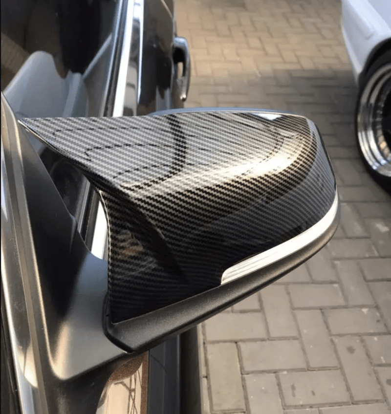 Carbon fiber mirror caps BMW F32 - three-quarter view 2 - Becquet Voiture
