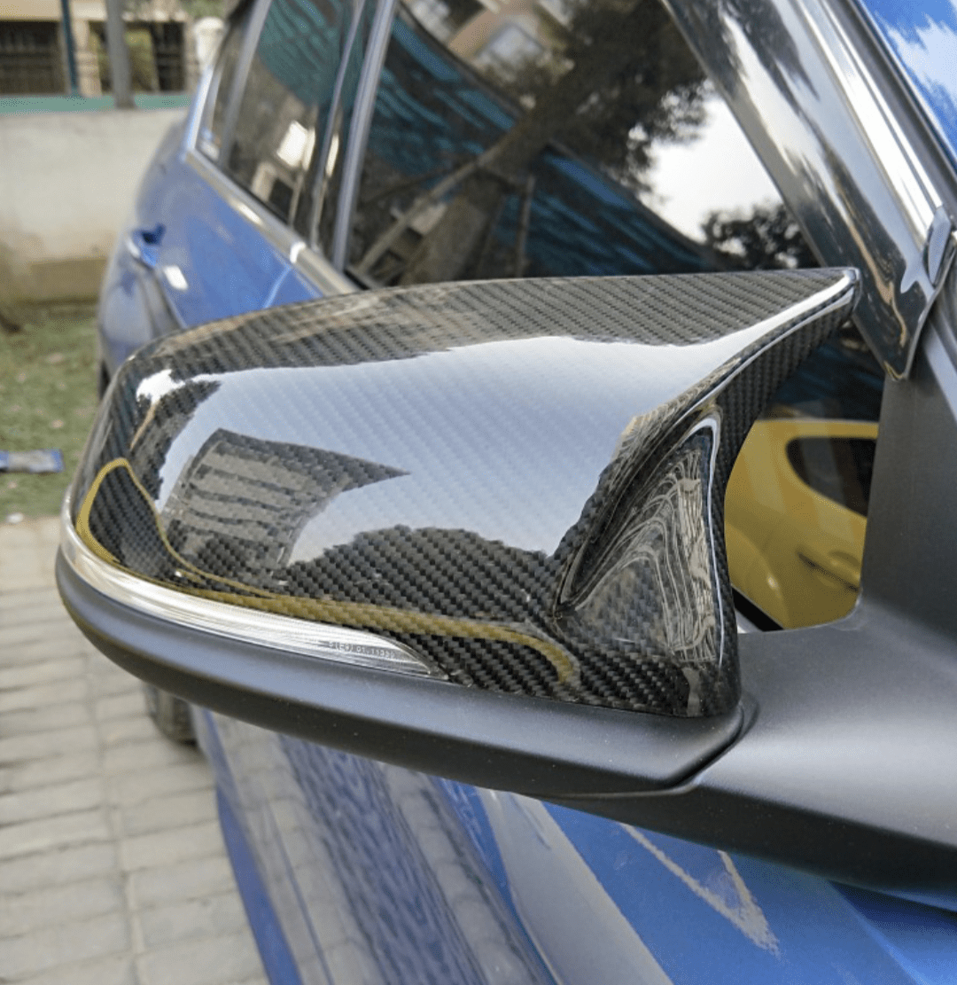 Coques rétroviseurs carbone BMW X1 E84 - vue de face - Becquet Voiture