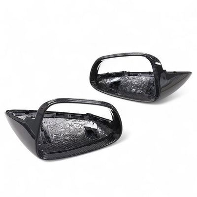 https://cdn.shopify.com/s/files/1/0565/4957/2747/files/coques_de_retroviseurs_fibre_de_carbone_porsche_911_992_718_boxster_cayman_macan2.jpg?v=1763975550